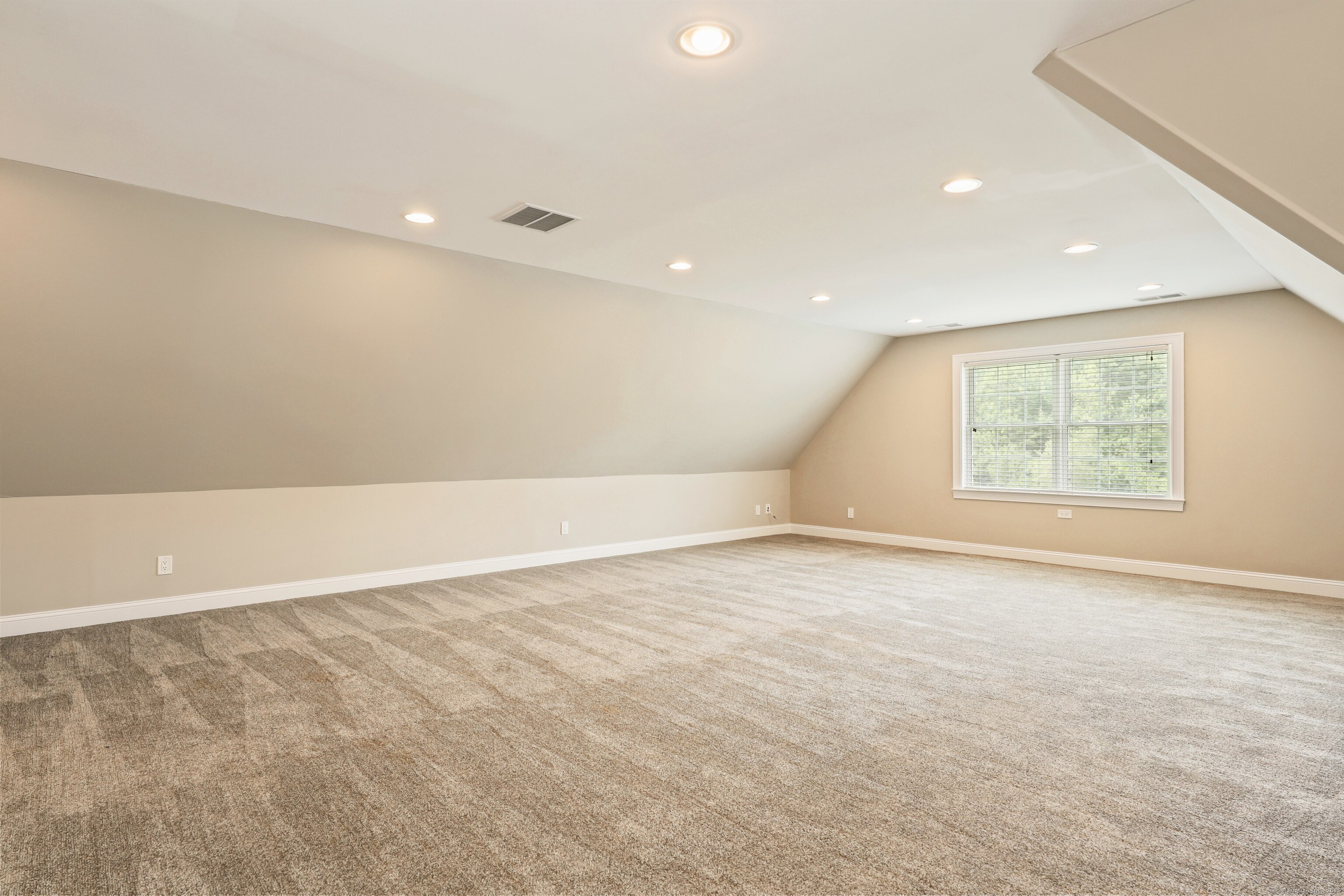 17 Hunters Ridge Wolcott, CT 06716 - Photo 32 of 40 an empty room with a empty space and window