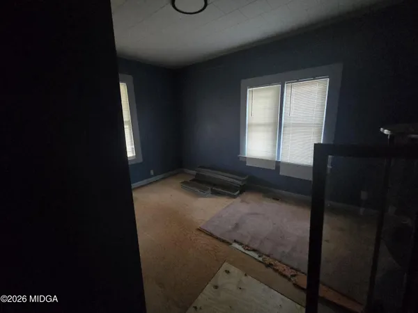 a view of a bathroom from a hallway