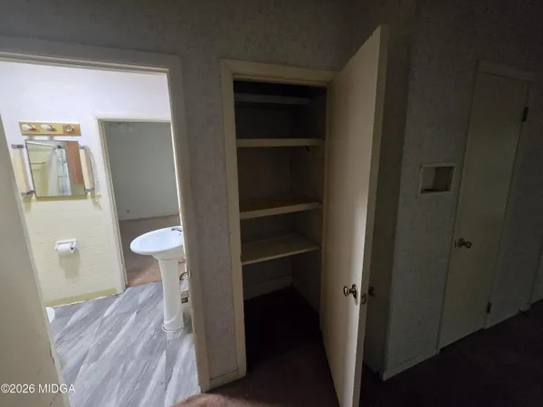 a view of storage and utility room