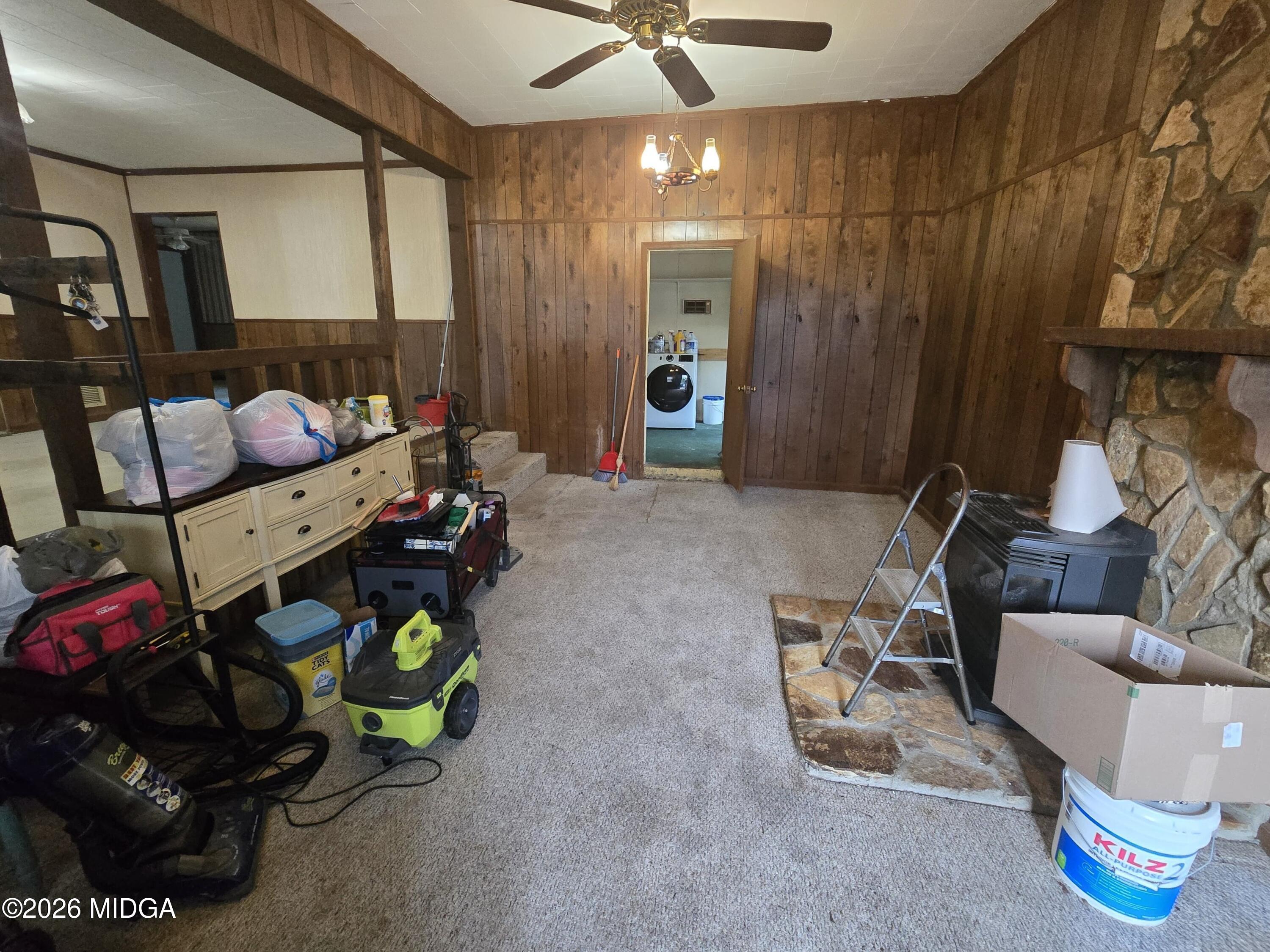 1070 Borum Street Unadilla, GA 31091 - Photo 7 of 18 a living room with furniture and a window
