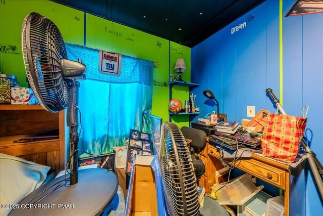 a view of a house with a snow in the background