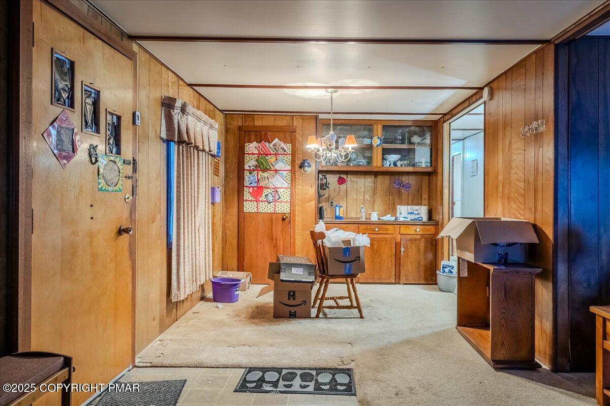 2099 North Turnpike Road Dalton, PA 18414 - Photo 5 of 16 a living room with a couch and a table