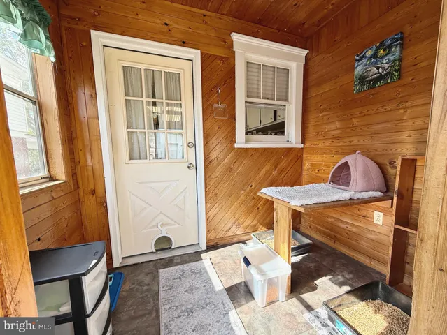 a view of a yard in front of a house with a yard