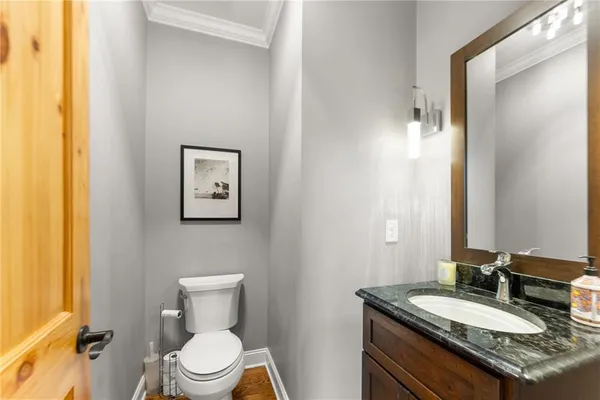 a bedroom with furniture and a ceiling fan