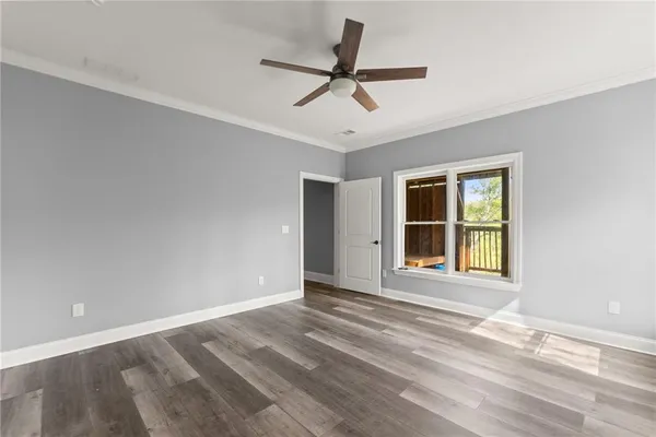 an aerial view of a house with yard and outdoor seating