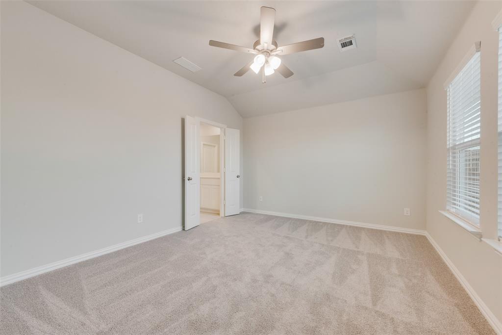 236 Sutter Mill Road Saginaw, TX 76131 - Photo 13 of 20 wooden floor in an empty room with a window