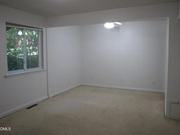 an empty room with a window