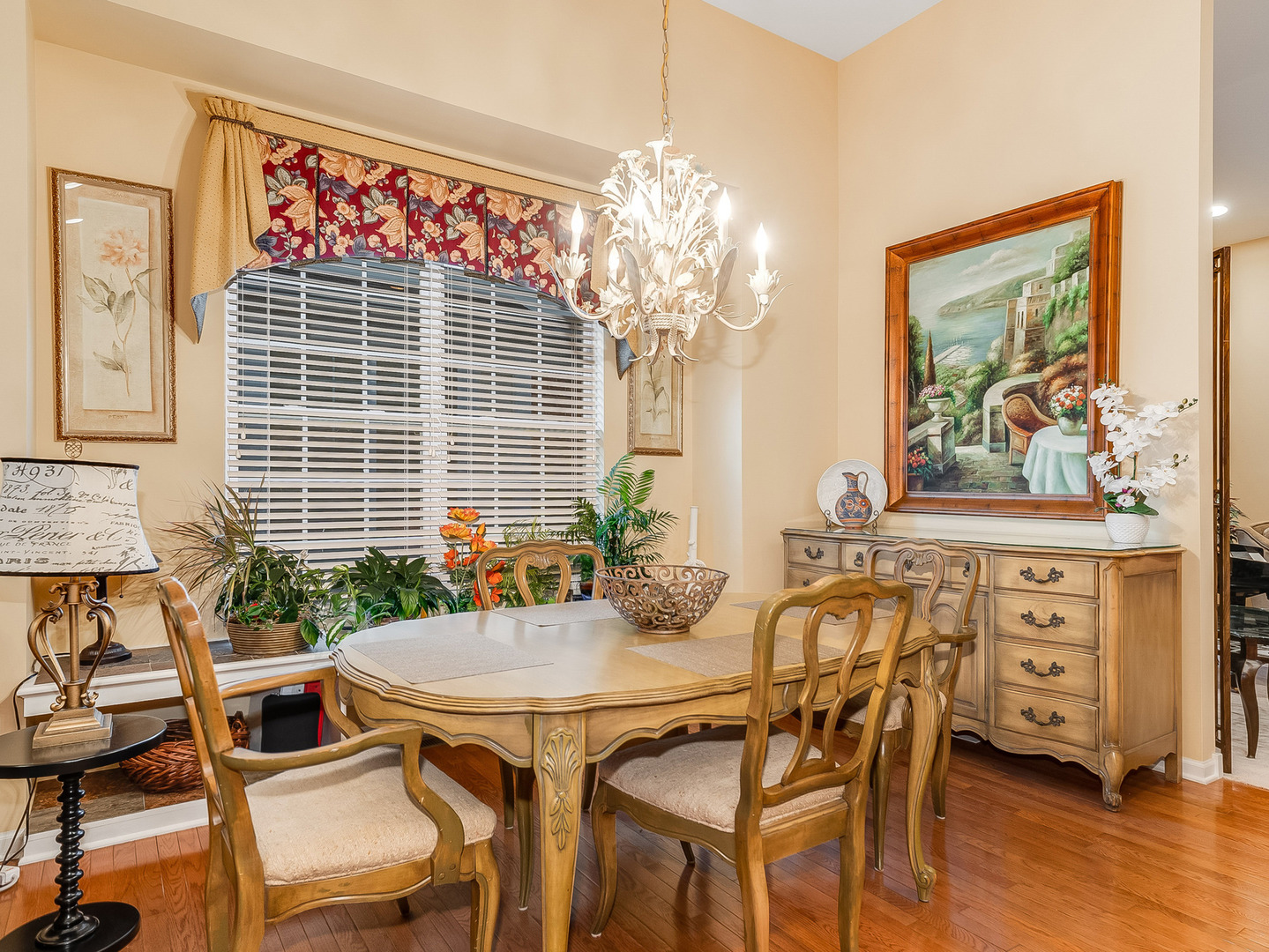 2805 Bond Circle, Unit 2805 Naperville, IL 60563 - Photo 11 of 30 a view of a dining room with furniture window and wooden floor