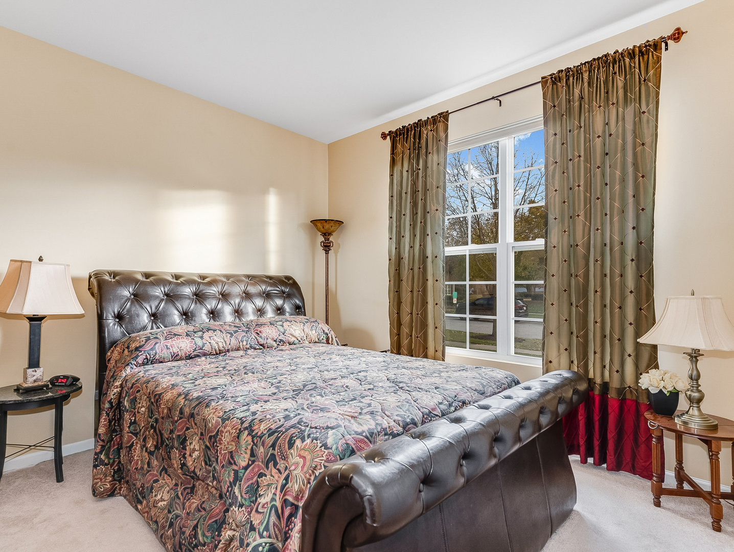 2805 Bond Circle, Unit 2805 Naperville, IL 60563 - Photo 18 of 30 a bedroom with a large bed and a window