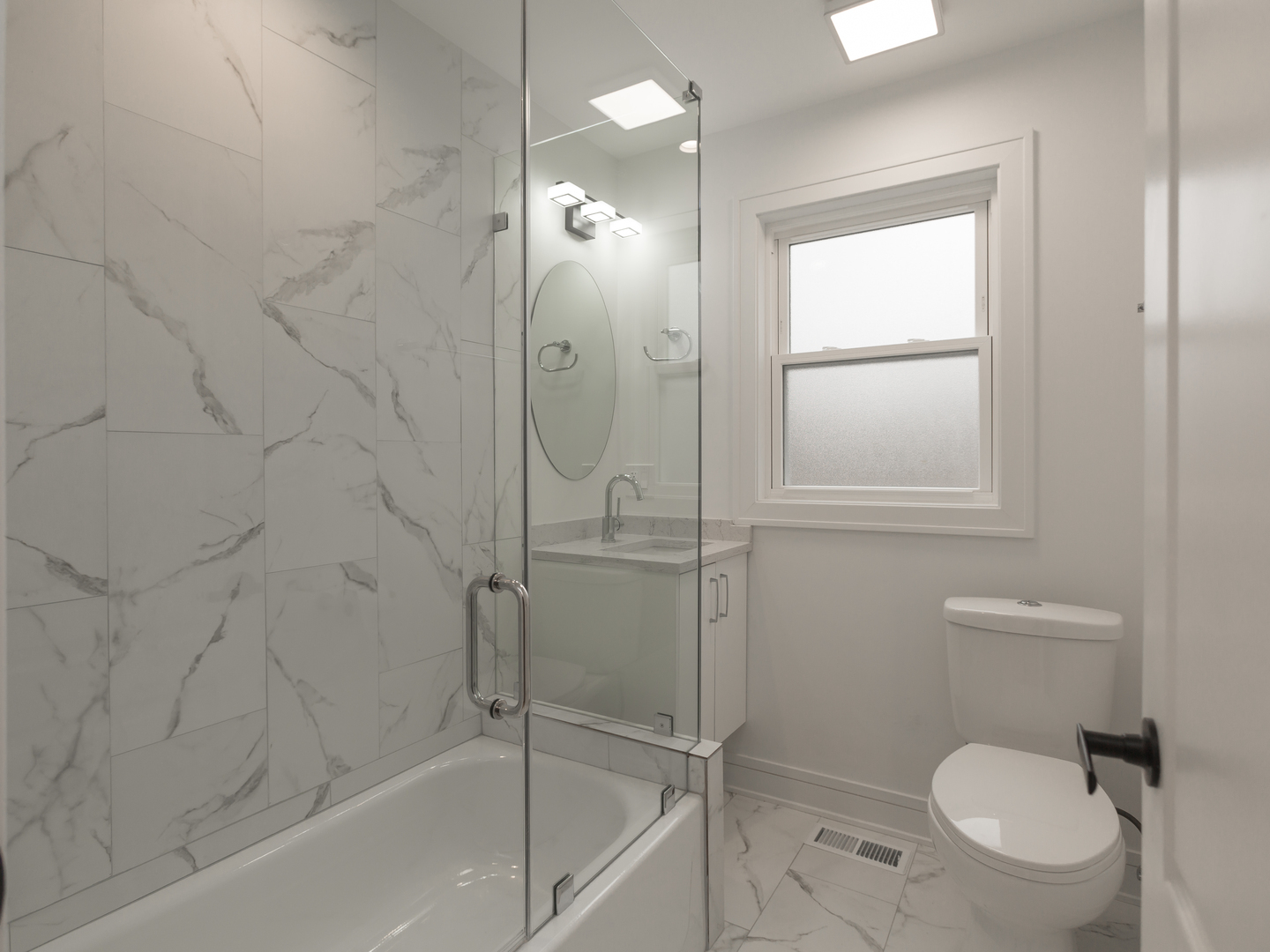 6310 Hilly Way Cary, IL 60013 - Photo 24 of 67 a bathroom with a toilet and a shower