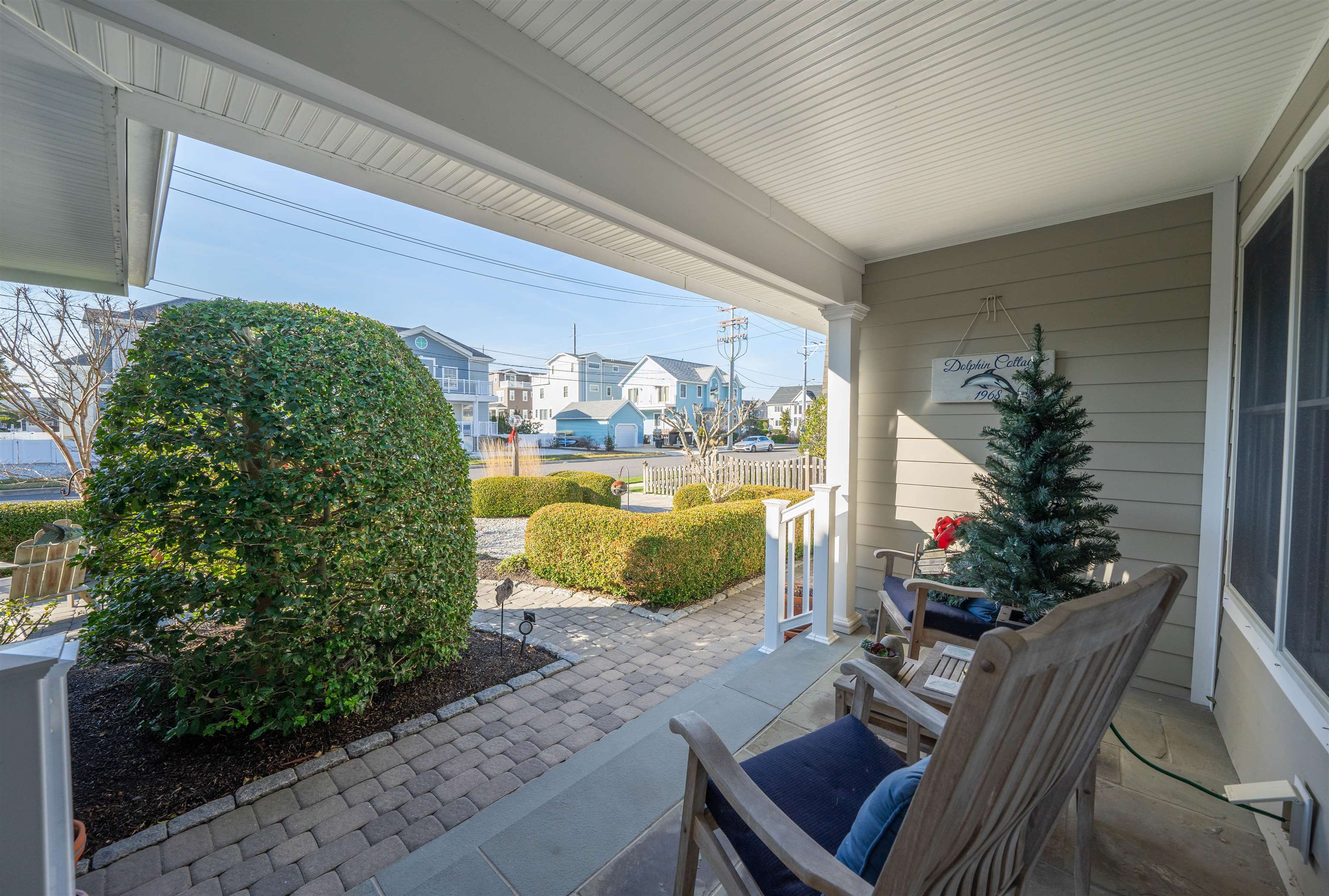 273 60th Street Avalon, NJ 08202 - Photo 2 of 33 a balcony with furniture and a potted plant