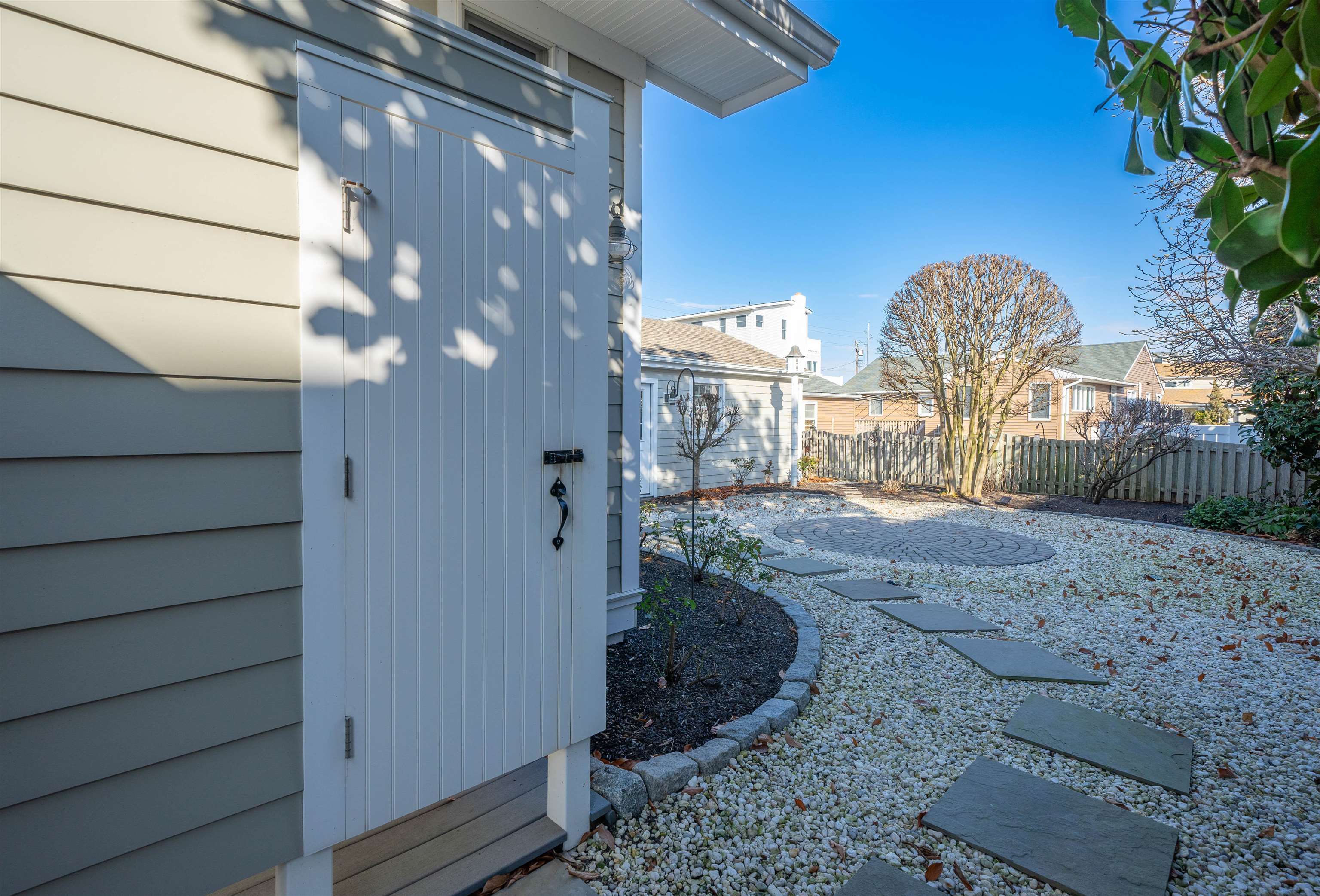 273 60th Street Avalon, NJ 08202 - Photo 24 of 33 a view of a back yard of the house