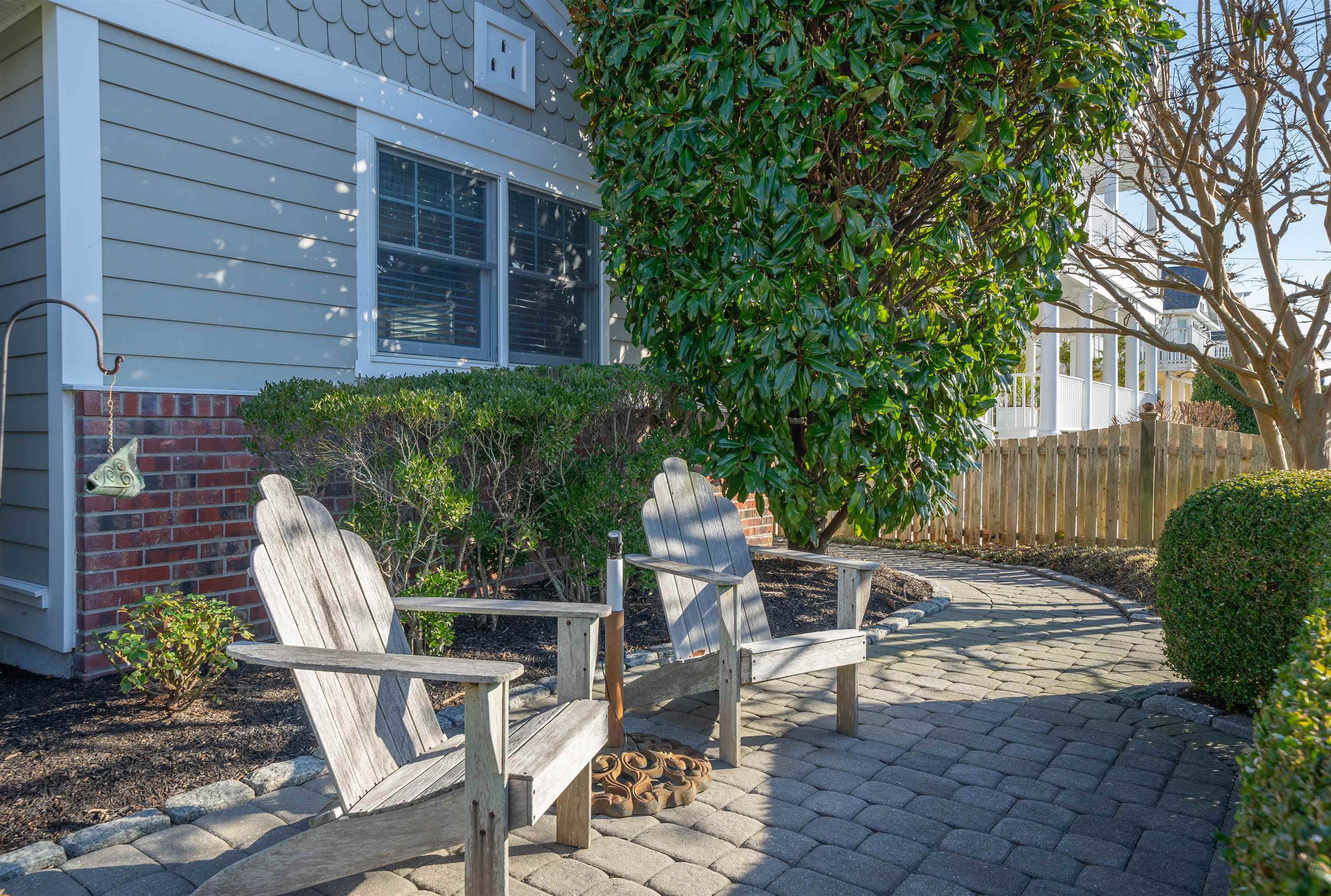 273 60th Street Avalon, NJ 08202 - Photo 3 of 33 a view of backyard with outdoor seating and plants