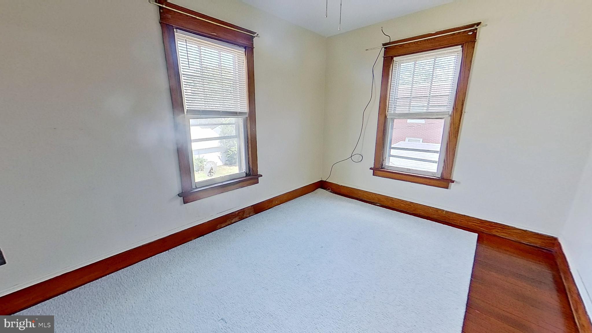 607 3rd Street Hanover, PA 17331 - Photo 11 of 12 a view of an empty room with windows