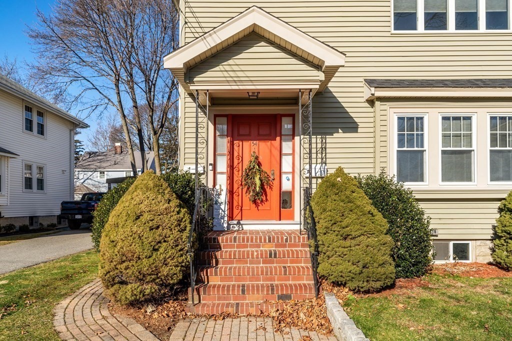 54 Chester Road, Unit 1 Belmont, MA 02478 - Photo 2 of 31 a view of a house with a door and pathway