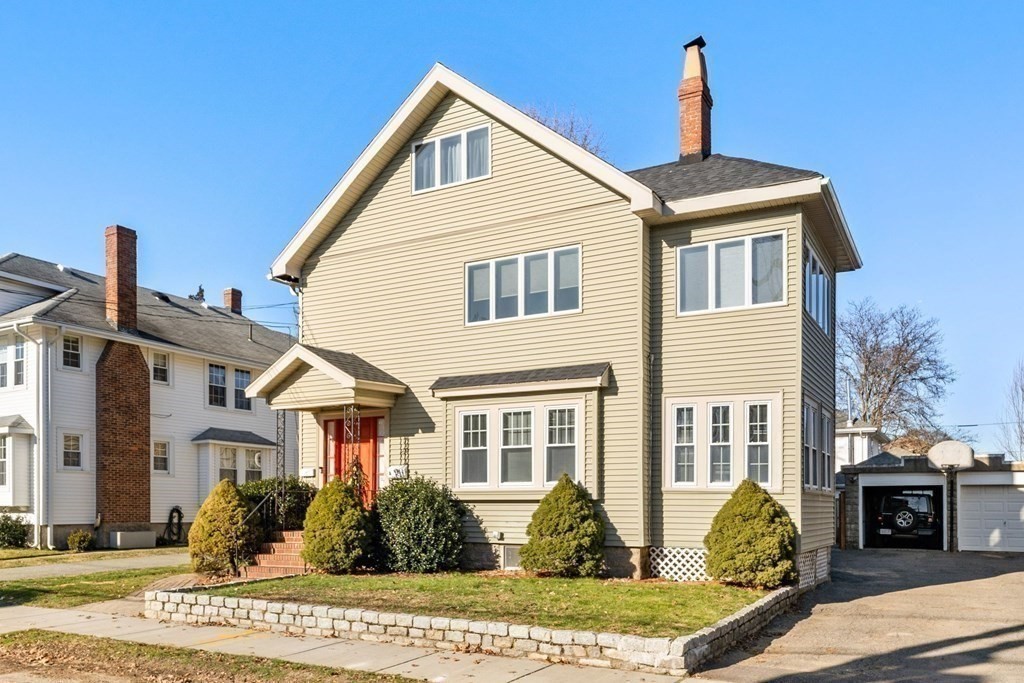 54 Chester Road, Unit 1 Belmont, MA 02478 - Photo 28 of 31 a front view of a house with garden
