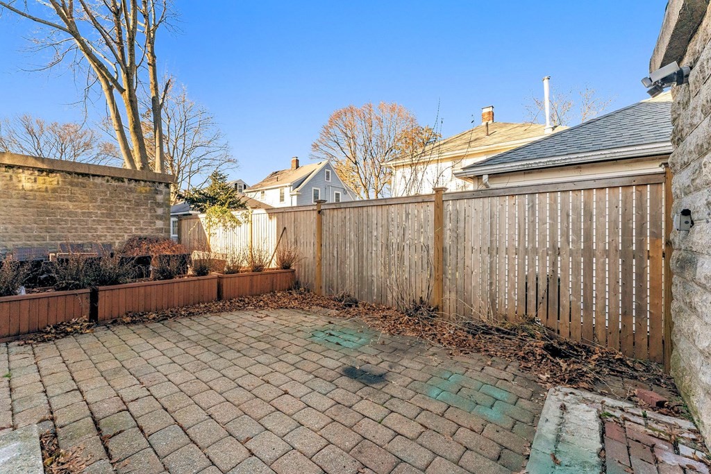 54 Chester Road, Unit 1 Belmont, MA 02478 - Photo 30 of 31 a view of a backyard
