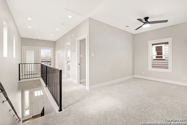 a view of a hallway with entryway