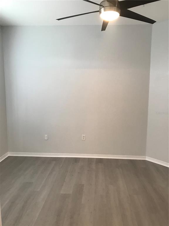 5122 Northridge Road, Unit 306 Sarasota, FL 34238 - Photo 13 of 21 a view of a room with racks on the wall