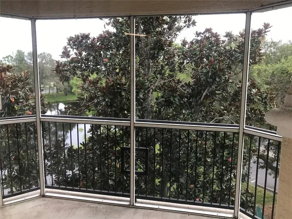 a view of a balcony with an outdoor space