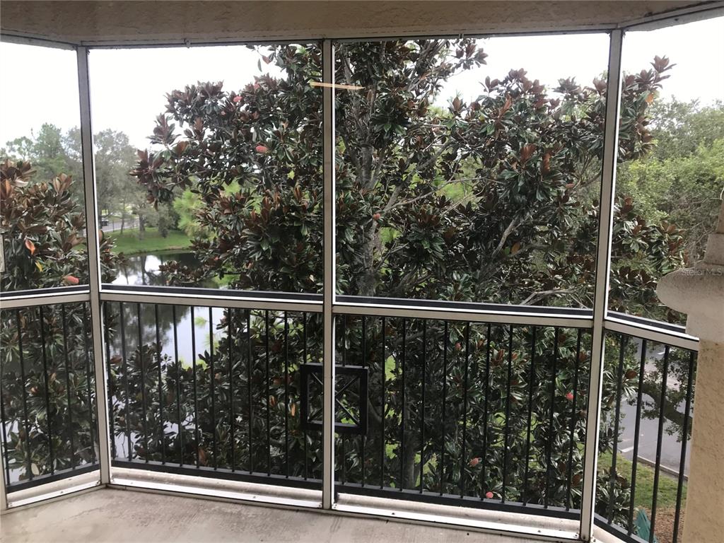 5122 Northridge Road, Unit 306 Sarasota, FL 34238 - Photo 16 of 21 a view of a balcony with an outdoor space