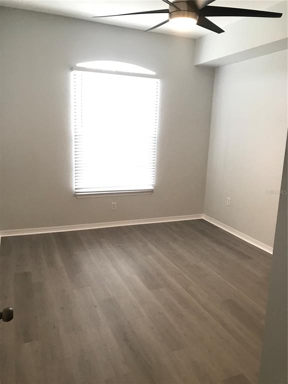 5122 Northridge Road, Unit 306 Sarasota, FL 34238 - Photo 8 of 21 an empty room with a window
