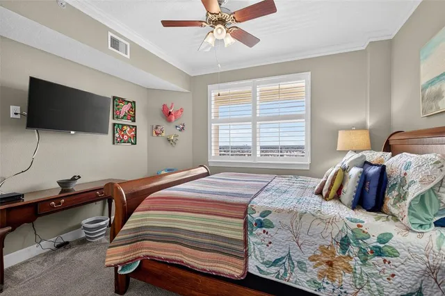 a view of a balcony with chair and ocean view