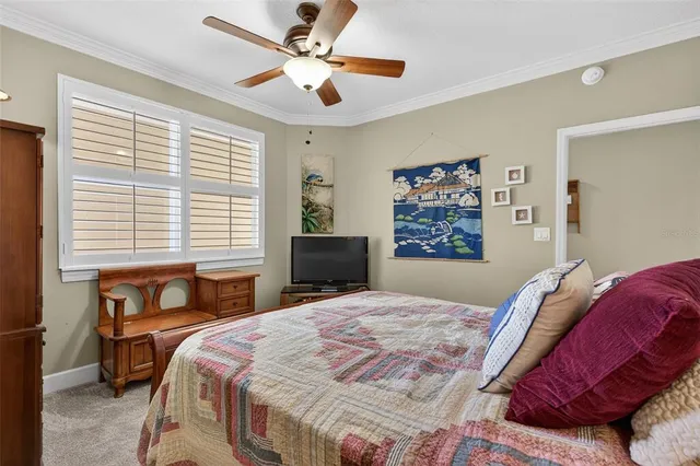a view of a house with swimming pool and sitting area