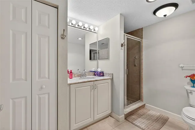 a view of a house with pool and a yard