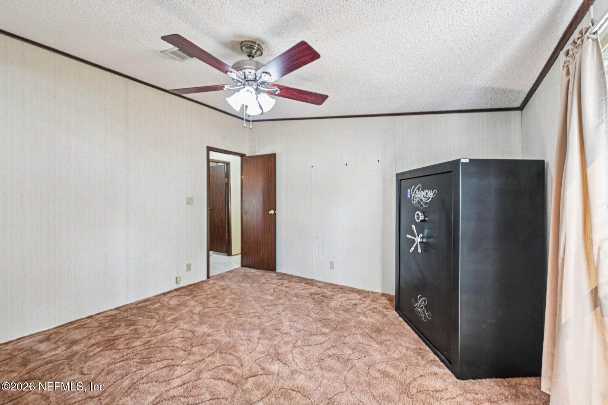 128 Sesame Street Middleburg, FL 32068 - Photo 45 of 66 Large Guest Bedroom
