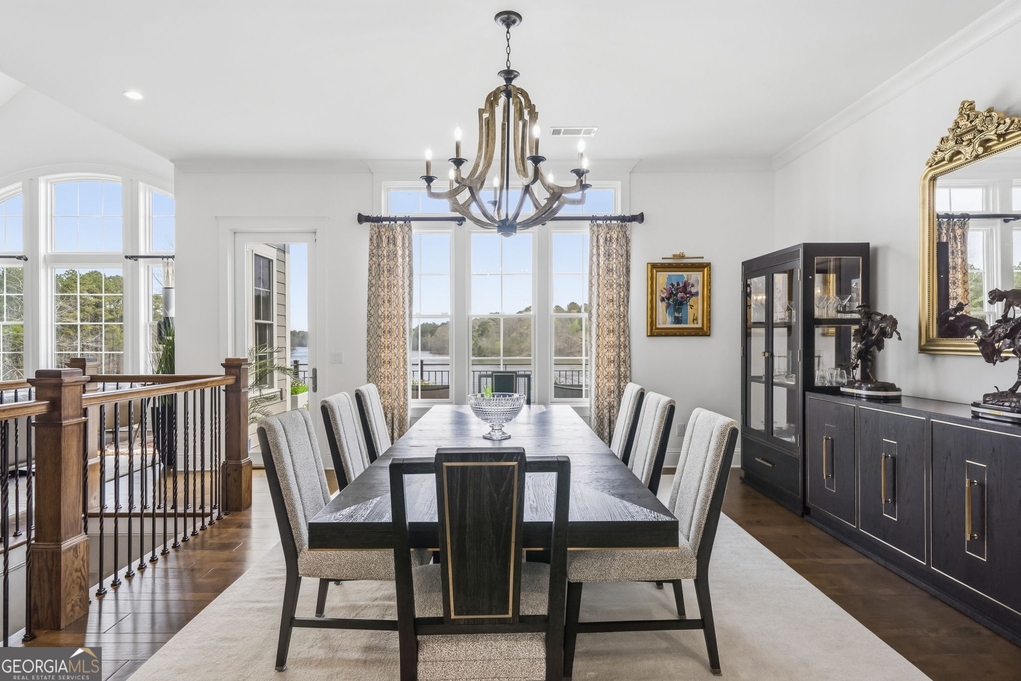 1060 Rdg Grv Court Greensboro, GA 30642 - Photo 12 of 68 a view of a dining room with furniture window and wooden floor