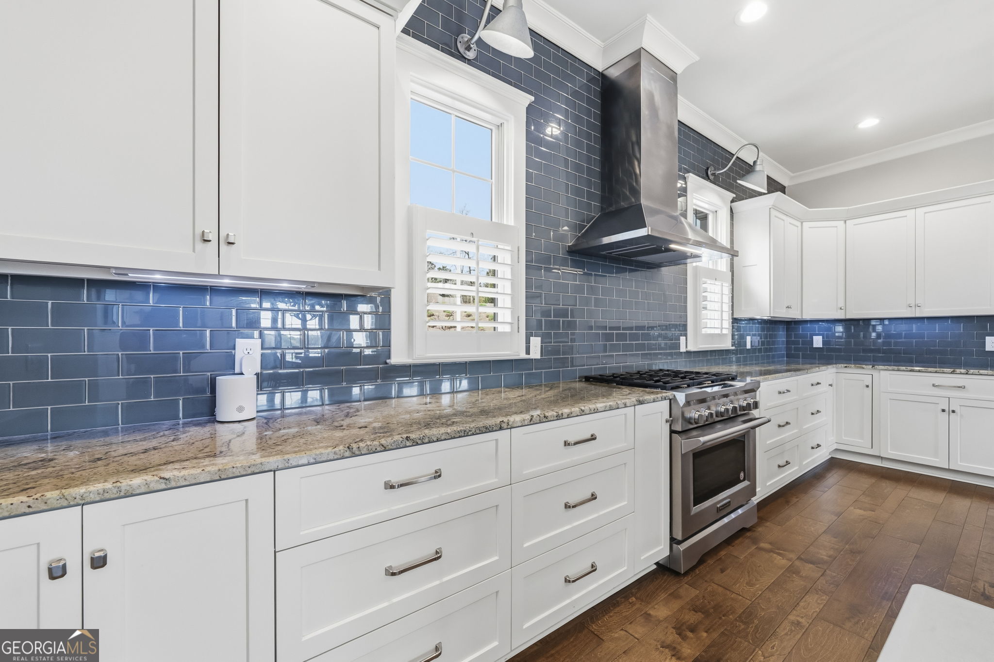 1060 Rdg Grv Court Greensboro, GA 30642 - Photo 16 of 68 a kitchen with granite countertop a sink stainless steel appliances and cabinets
