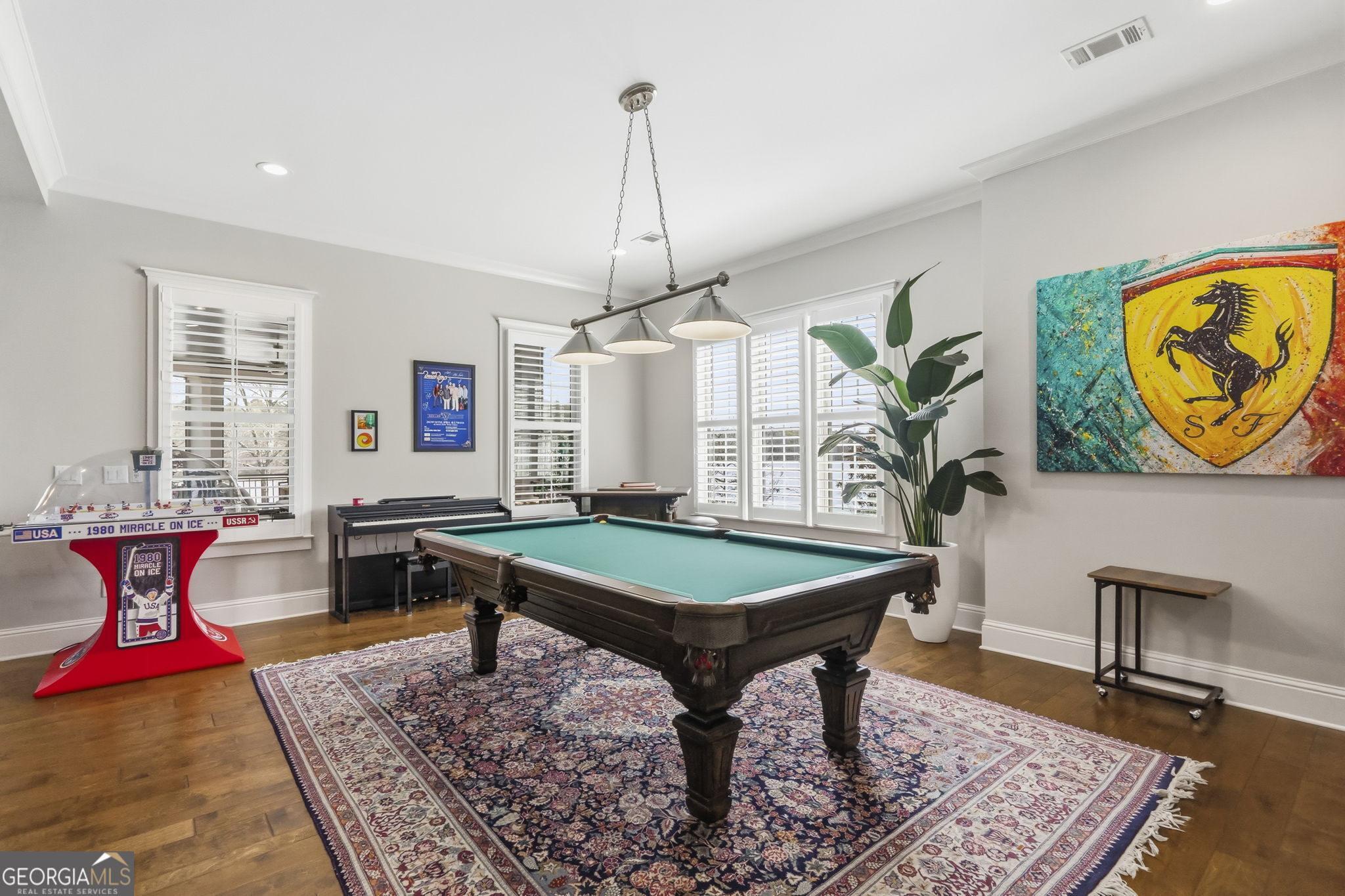 1060 Rdg Grv Court Greensboro, GA 30642 - Photo 44 of 68 a living room with furniture a rug and a chandelier