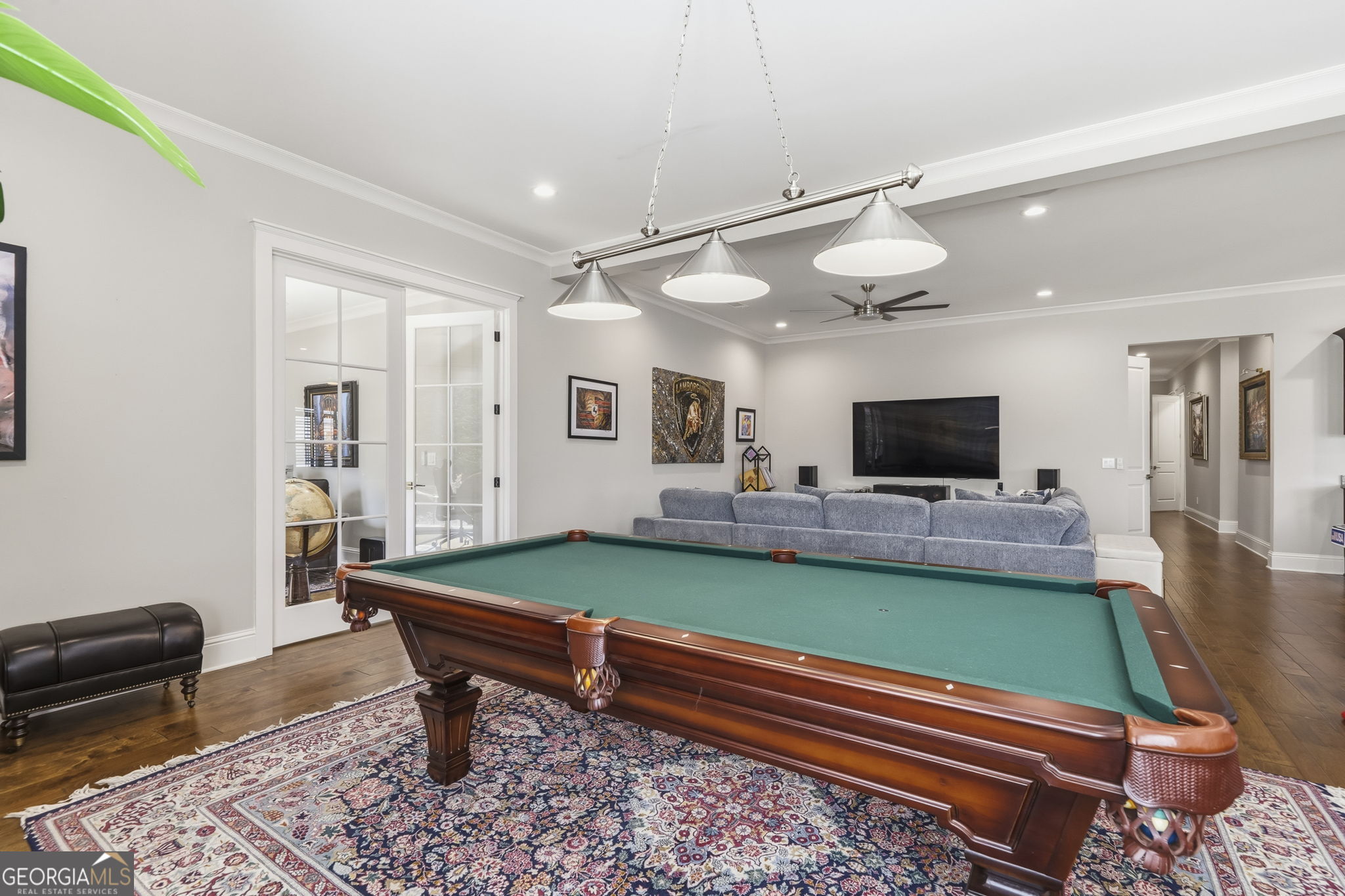 1060 Rdg Grv Court Greensboro, GA 30642 - Photo 45 of 68 a living room with furniture and a flat screen tv