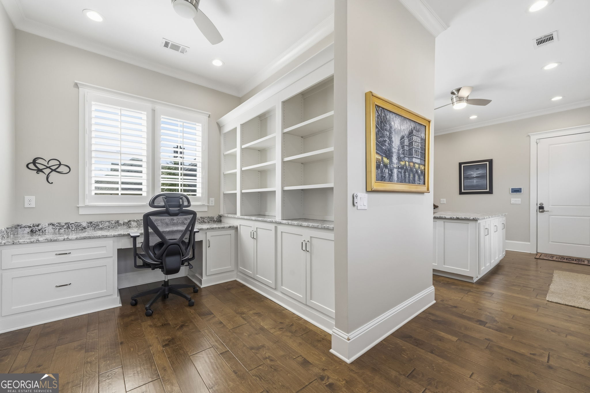 1060 Rdg Grv Court Greensboro, GA 30642 - Photo 51 of 68 a view of a workspace with furniture and a window
