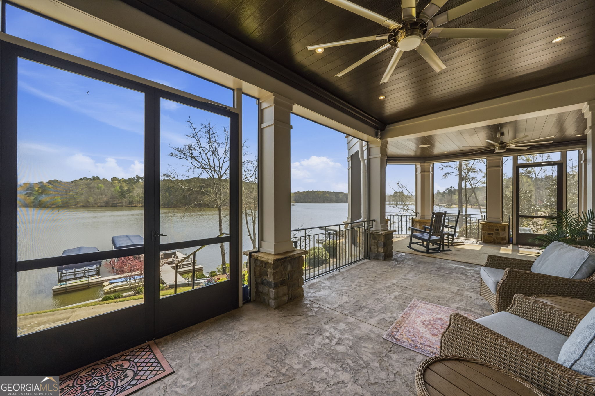 1060 Rdg Grv Court Greensboro, GA 30642 - Photo 60 of 68 a living room with furniture and a floor to ceiling window