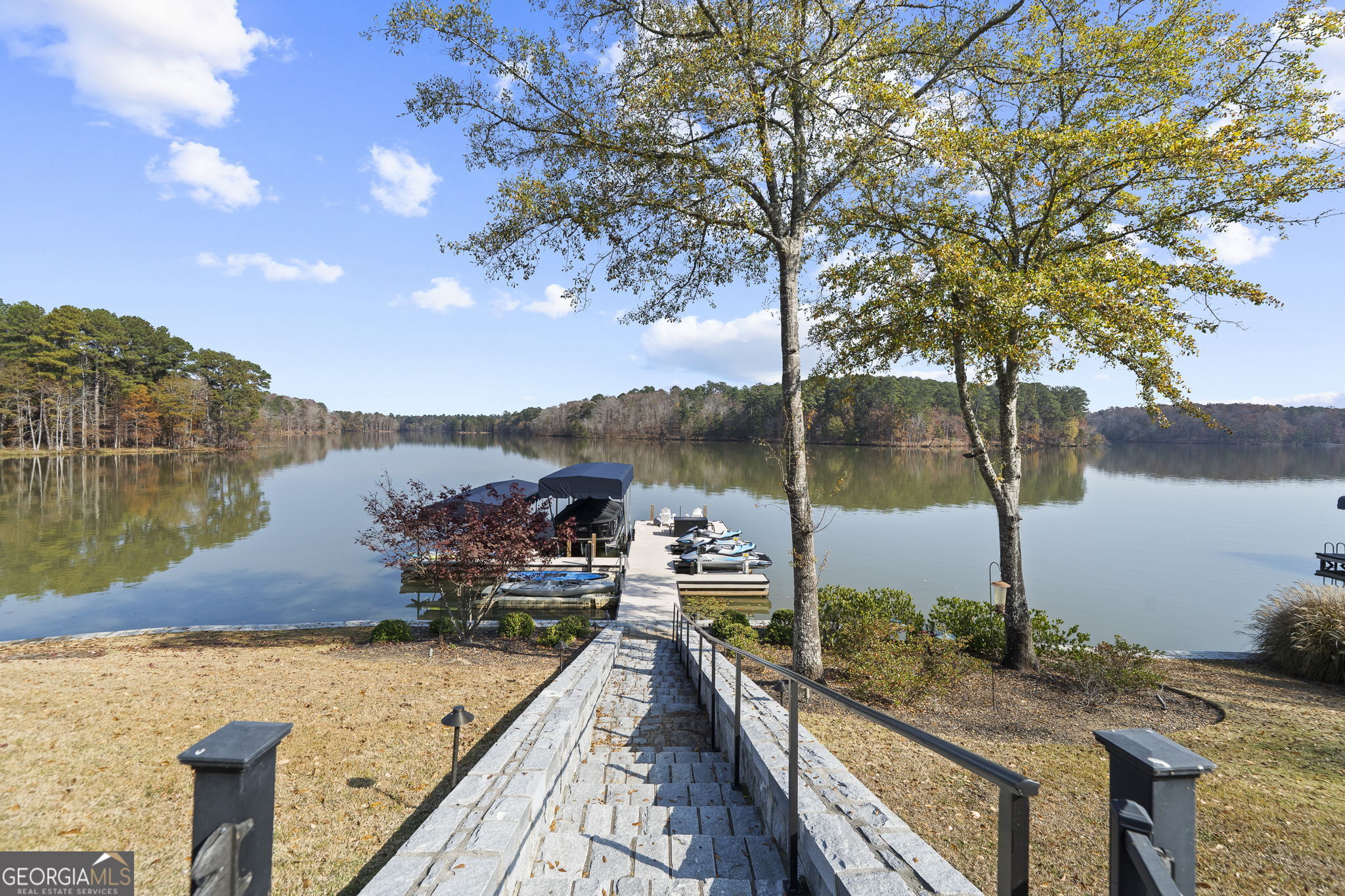 1060 Rdg Grv Court Greensboro, GA 30642 - Photo 64 of 68 a view of a lake with a sitting area