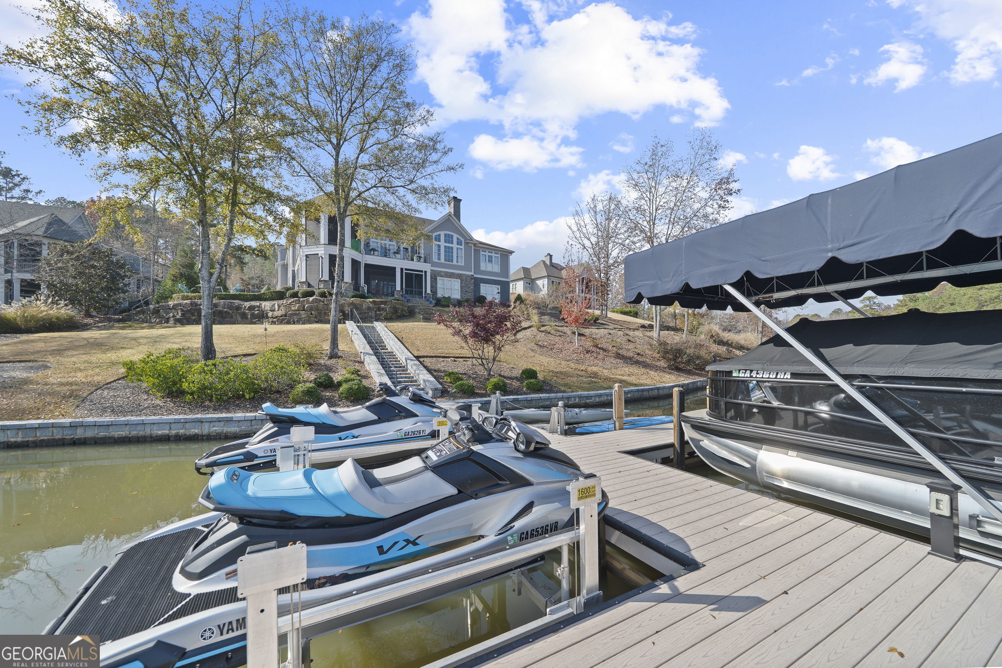 1060 Rdg Grv Court Greensboro, GA 30642 - Photo 67 of 68 a view of a house with pool and chairs