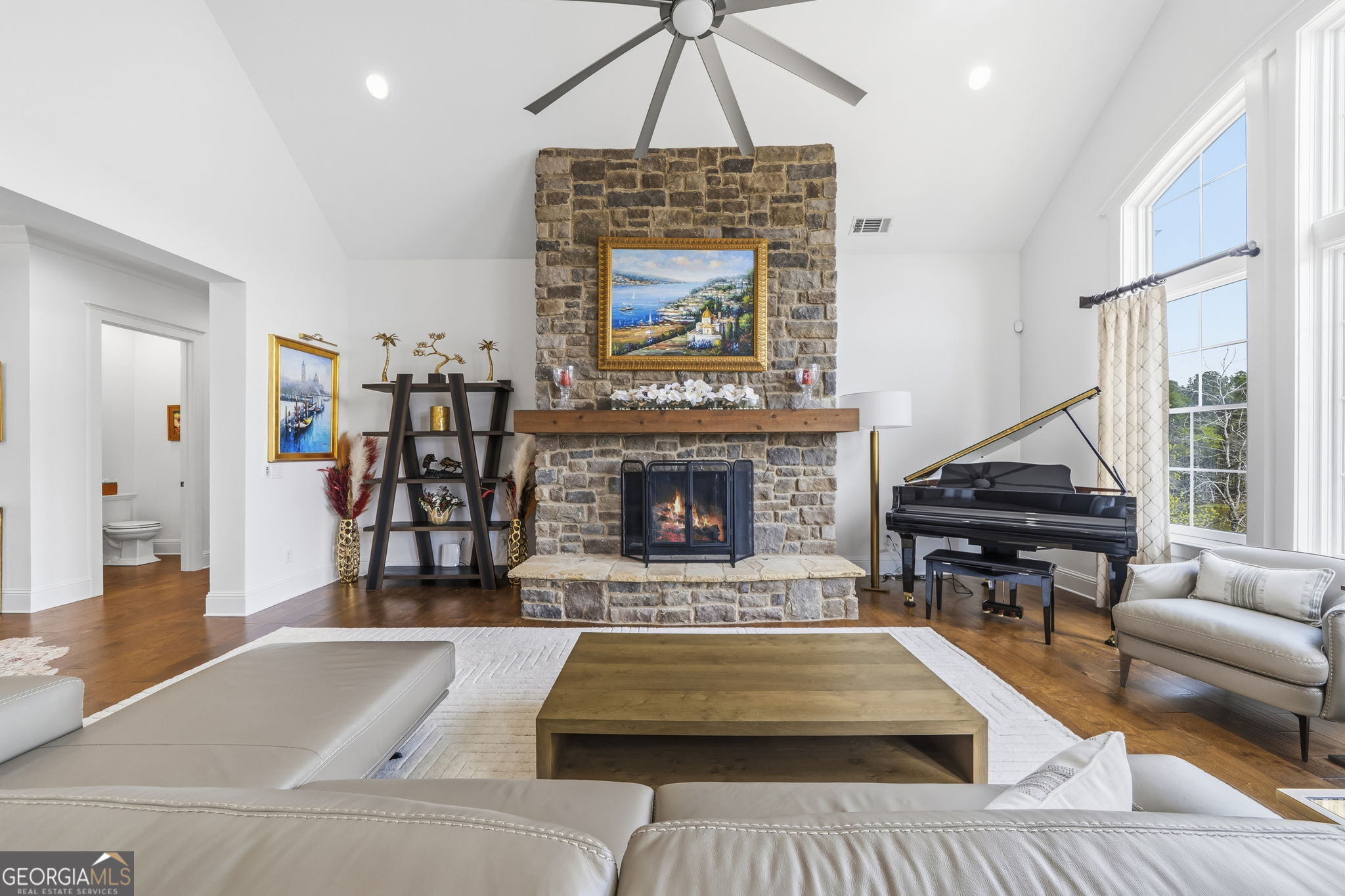 1060 Rdg Grv Court Greensboro, GA 30642 - Photo 9 of 68 a living room with furniture a pool table and a fireplace