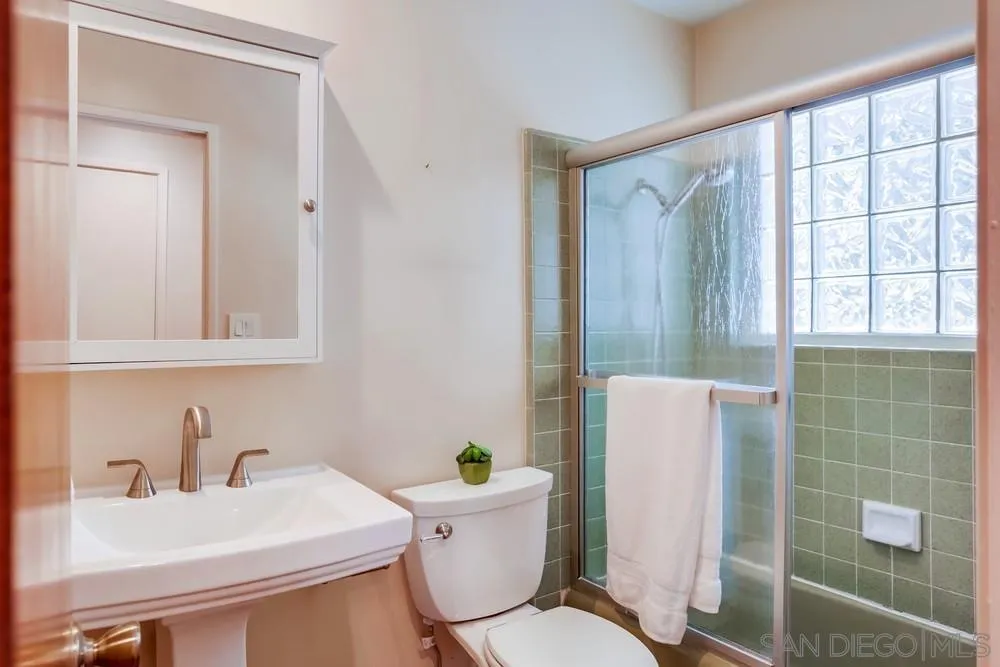 1839 Kent Place Vista, CA 92084 - Photo 25 of 40 a bathroom with a sink toilet and shower