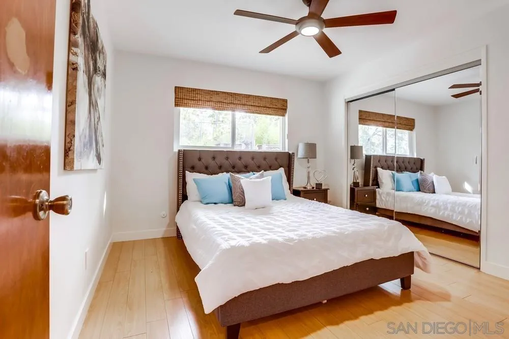 1839 Kent Place Vista, CA 92084 - Photo 26 of 40 a bedroom with a bed and window
