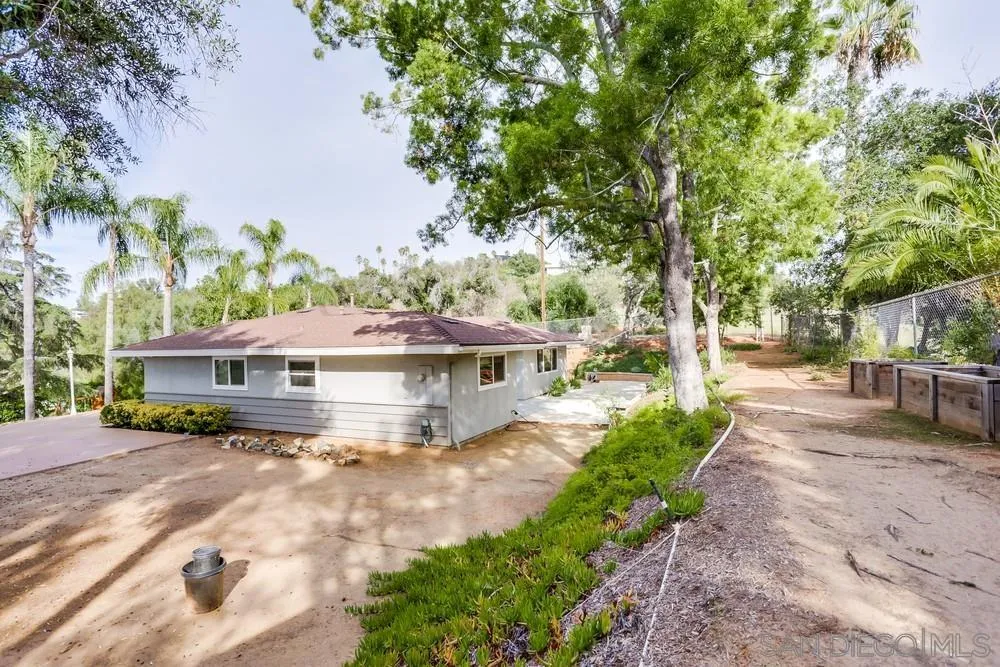 1839 Kent Place Vista, CA 92084 - Photo 34 of 40 a house with trees in front of it