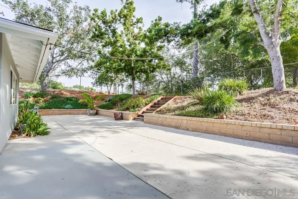 1839 Kent Place Vista, CA 92084 - Photo 35 of 40 a view of a street with a large tree