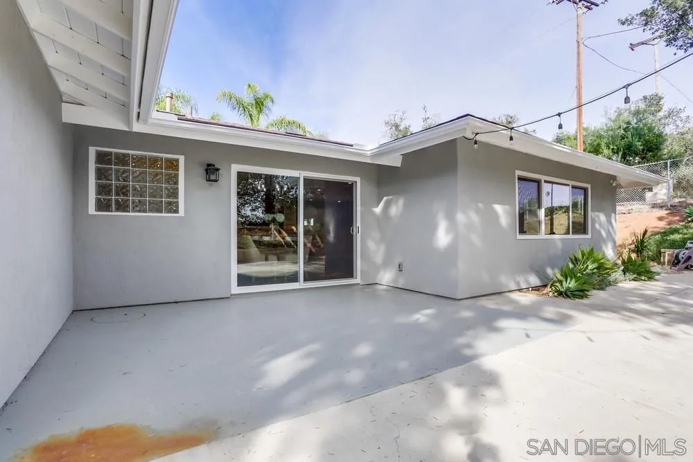 1839 Kent Place Vista, CA 92084 - Photo 36 of 40 a view of a house with a yard and potted plants