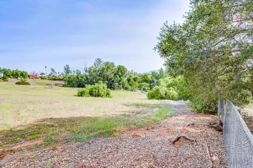 1839 Kent Place Vista, CA 92084 - Photo 37 of 40 a view of a lake with a yard