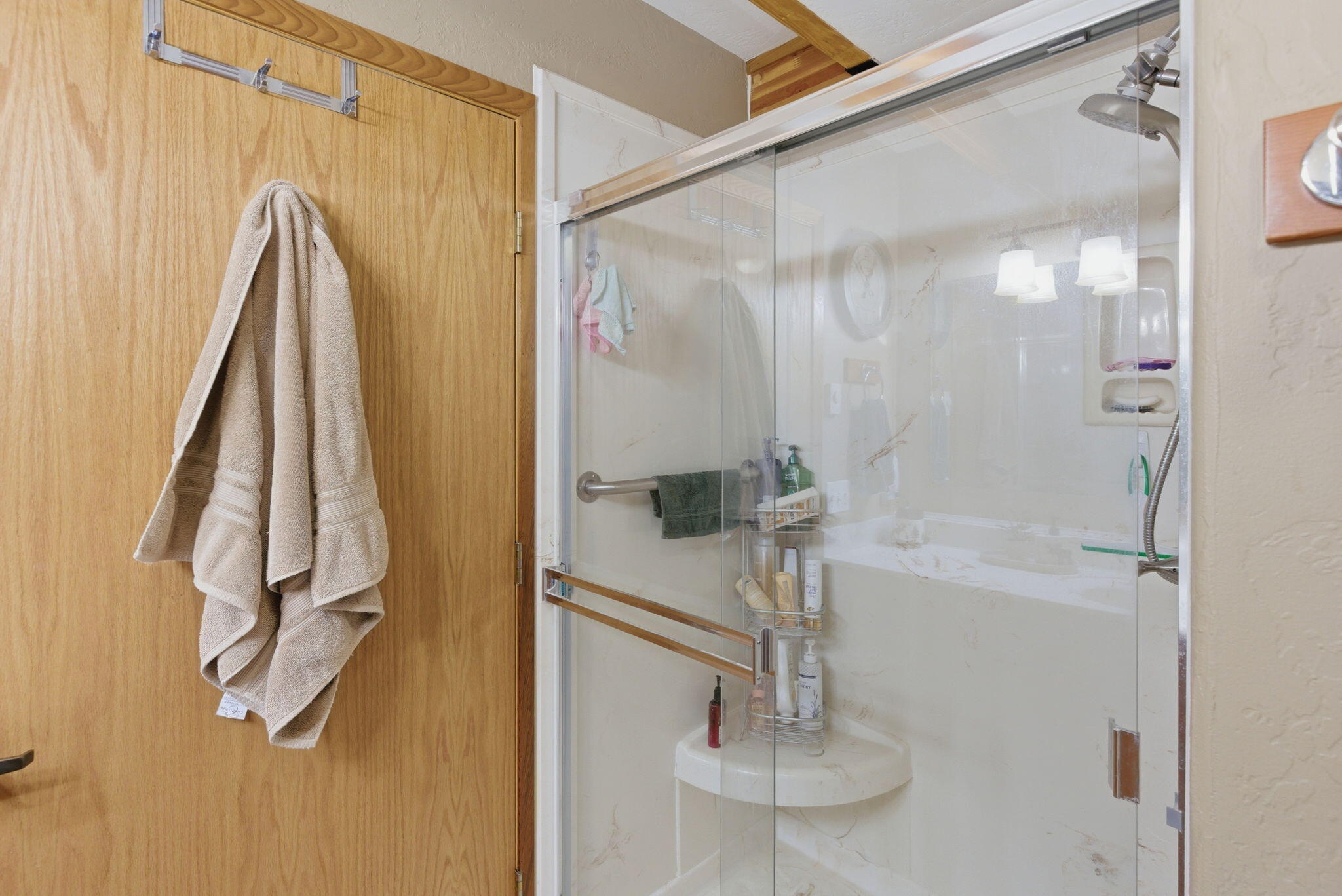 856 Greentree Loop Grants Pass, OR 97527 - Photo 40 of 62 a bathroom with a shower and a sink
