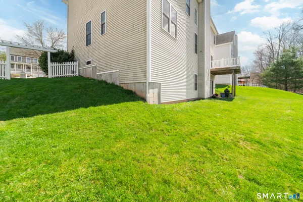 a view of a back yard of the house