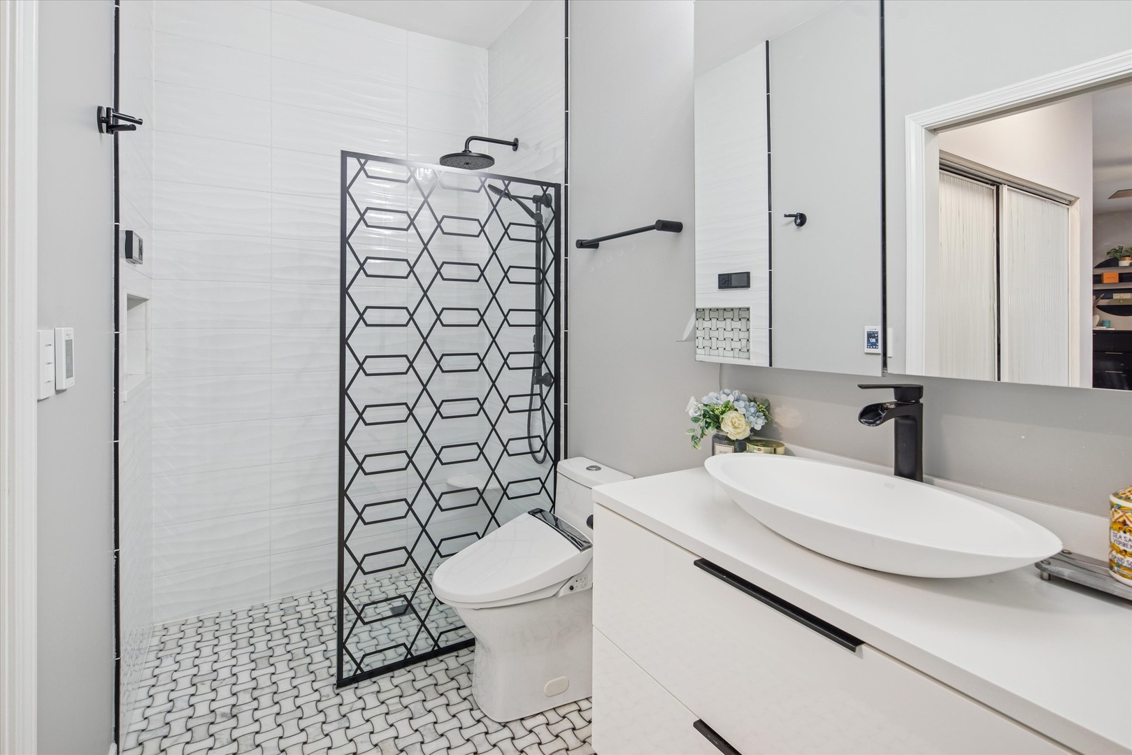 301 West Scott Street, Unit 103 Chicago, IL 60610 - Photo 11 of 17 a bathroom with a sink toilet and shower