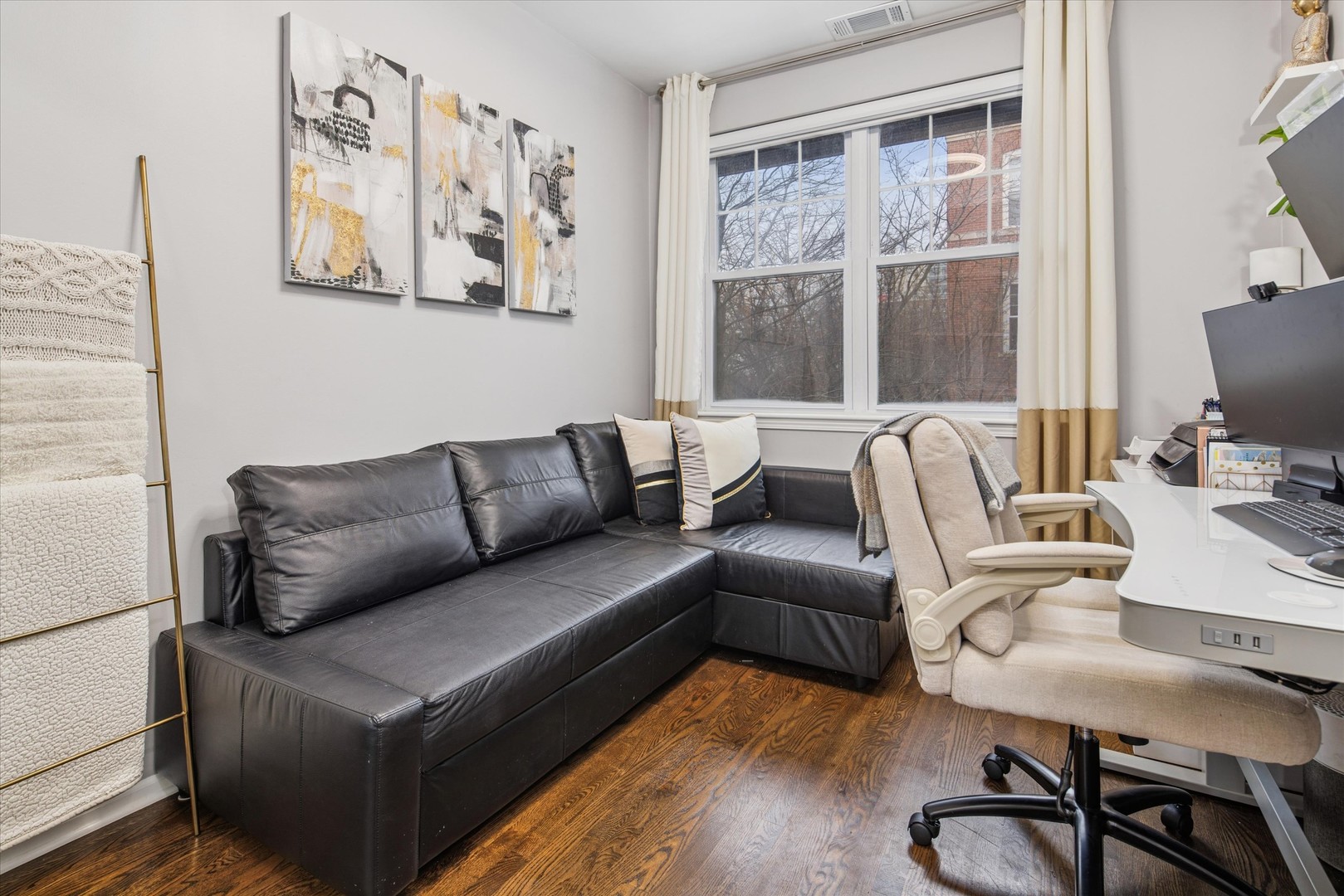 301 West Scott Street, Unit 103 Chicago, IL 60610 - Photo 12 of 17 a living room with furniture and a window