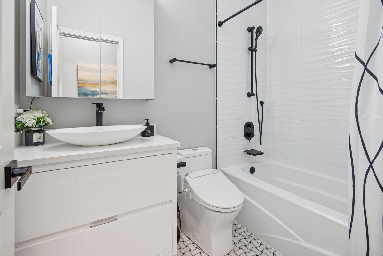 301 West Scott Street, Unit 103 Chicago, IL 60610 - Photo 13 of 17 a bathroom with a sink toilet and shower